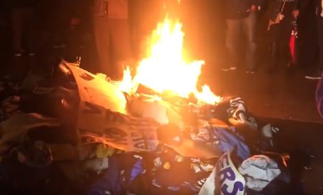 Burning Pile of football stuff